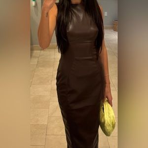 Sleeveless vegan leather dress. Worn ones.